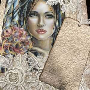 Notebook Journal, has blank pages to write on, comes with a bookmark.